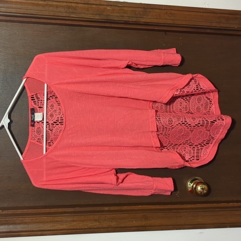 Coral tee with skull design in back by myth